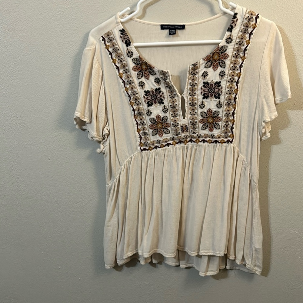 Cream and floral babydoll blouse